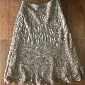 A 💯 % silk hand beaded skirt.